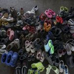a_pile_of_children_shoes_captured_during_refugees_crisis._refugee_crisis._budapest_hungary_central_europe_6_september_2015